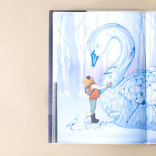 Load image into Gallery viewer, a-child-hugging-a-large-swan-made-from-snow