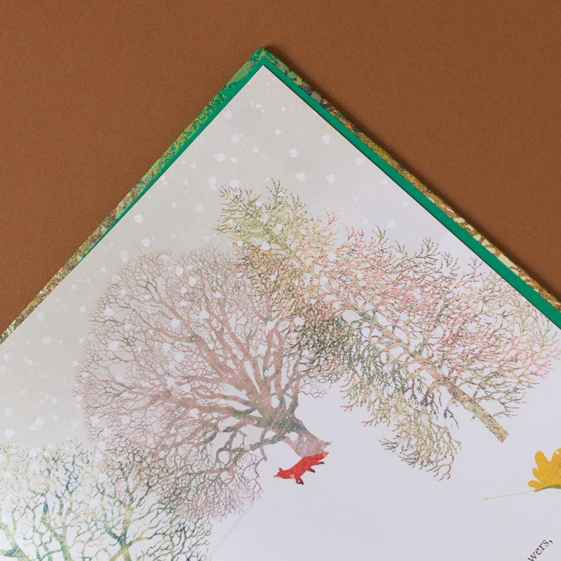 The-Green-Child-Book open page to winder in a forest with a fox