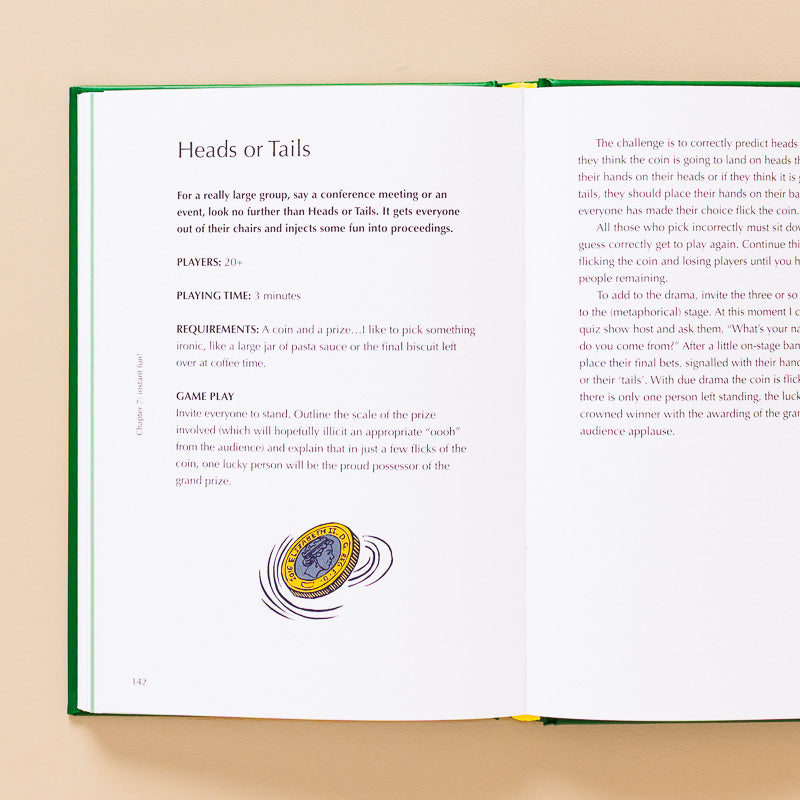 The_Joy_of_Games  illustration of heads or tails on open page