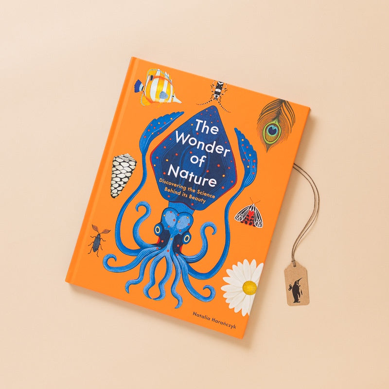 The_Wonder_of_Nature_-_Discovering_the_Science_Behind_its_Beauty_ orange cover with octopus, peacock feather, fish and other creatures