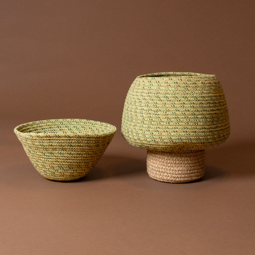Tree-Basket---Large Two woven baskets, one bowl-shaped and one cylindrical, on a brown background