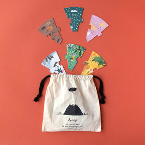 a-home-for-nature-layered-puzzle-pieces-and-carrying-bag