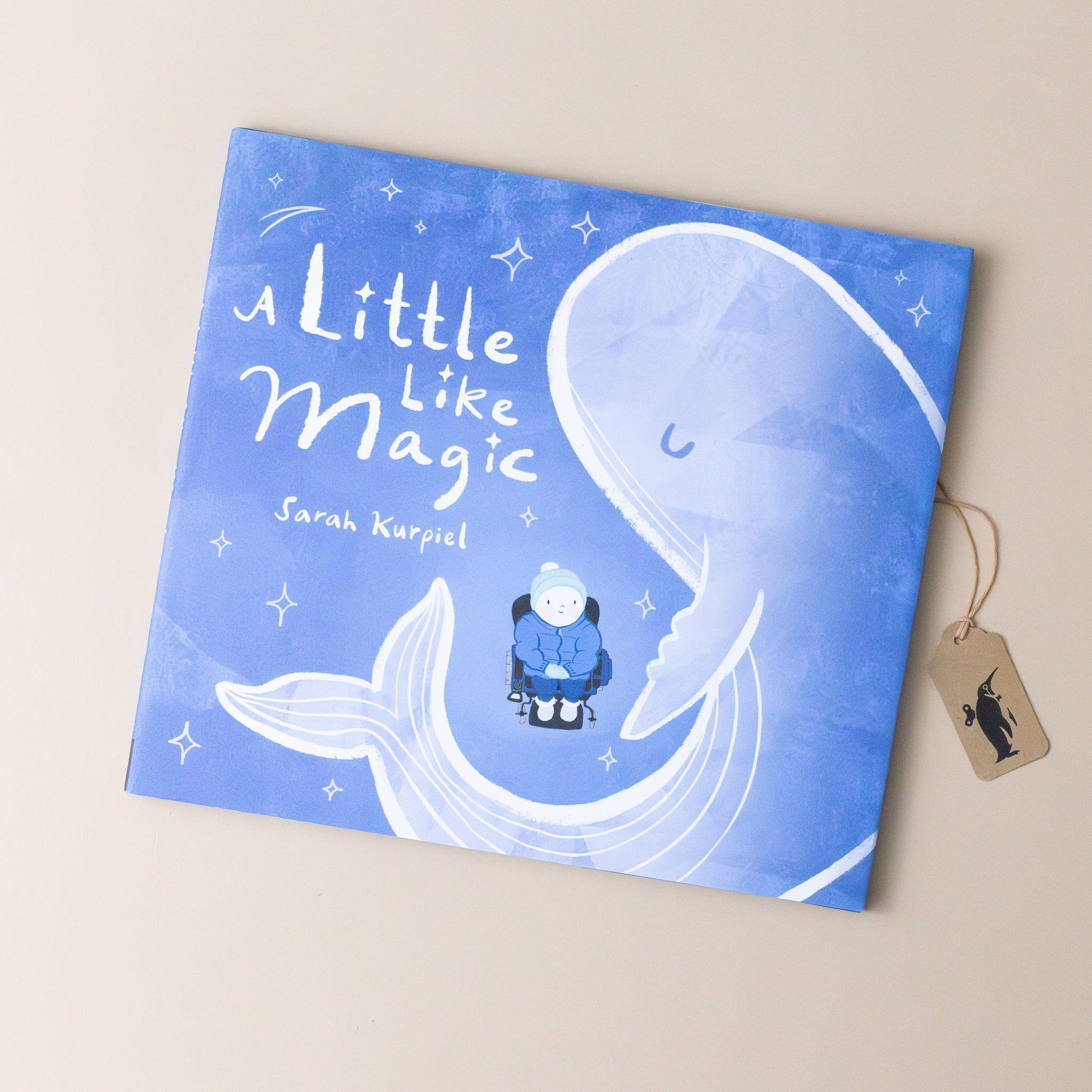 a-little-like-magic-book-book-cover-with-a-whale-above-a-grandmother-rocking