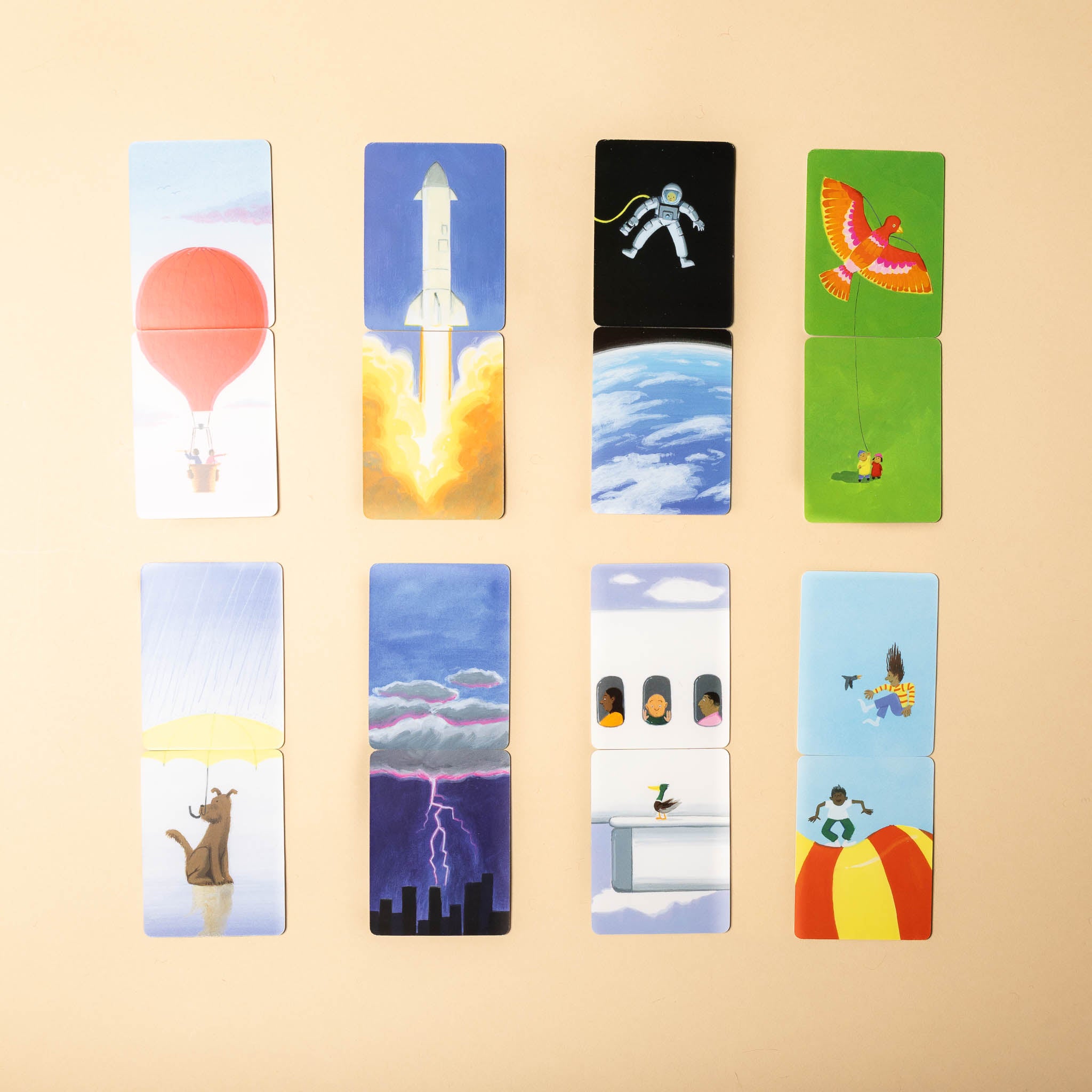 above-and-below-an-up-and-down-memory-game Set of colorful pieces with various illustrations on a beige background