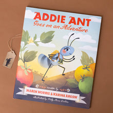 Load image into Gallery viewer, addie-ant-goes-on-an-adventure-book-cover-with-backpacked-ant-within-a-garden