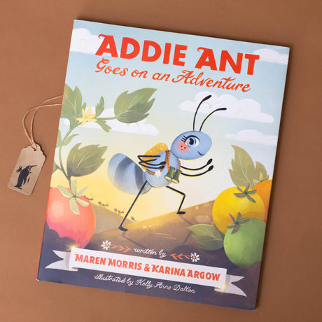 addie-ant-goes-on-an-adventure-book-cover-with-backpacked-ant-within-a-garden