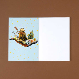 inside-of-card-with-bear-and-presents-on-a-magic-carpet-ride