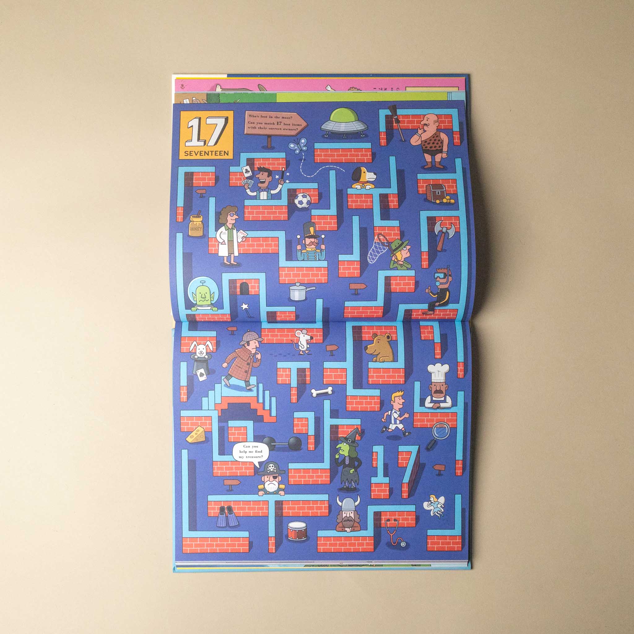 An open book or magazine spread showing a colorful illustrated maze page titled '17 SEVENTEN' on a beige background.