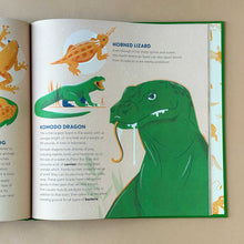 Load image into Gallery viewer, open book showing text and illustrations about the komodo dragon