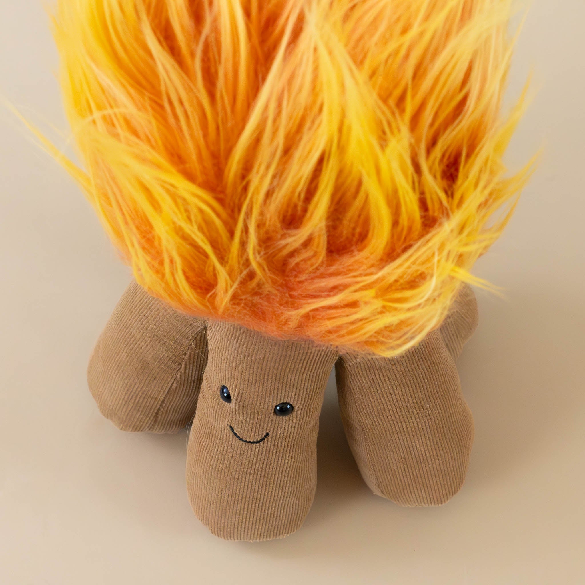 amuseable-campfire-with-brown-corded-wood-legs-and-orange-fur-fire-stuffed-toy