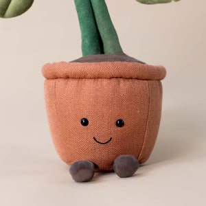 amuseable-monstera-plant-pot-with-two-eyes-and-a-smile