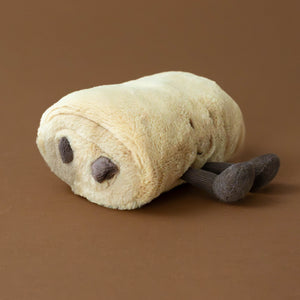 amuseable-pain-au-chocolat-stuffed-toy-tan-with-brown-corded-legs-side