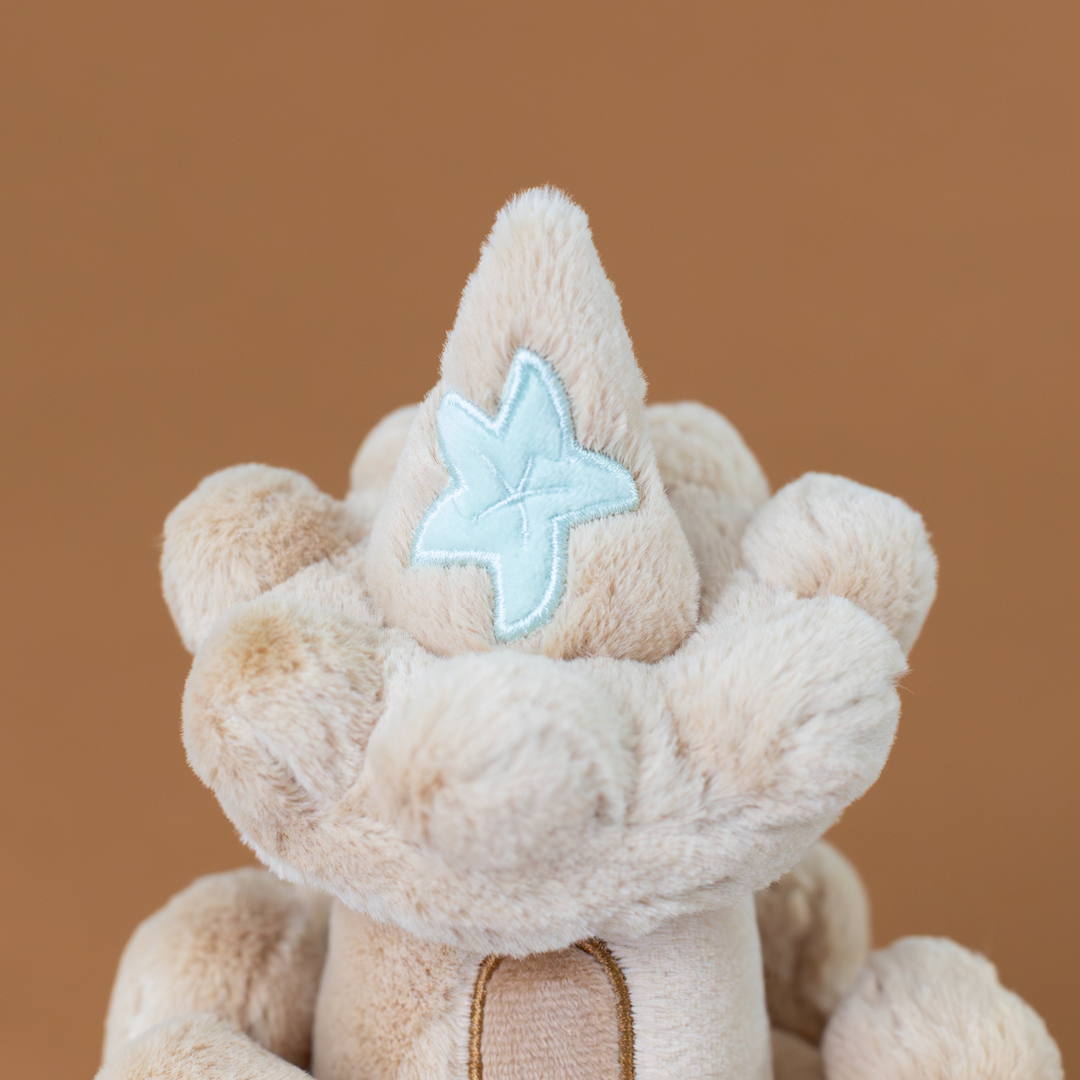 beige-amuseable-sandcastle-with-doors-windows-starfish-seashells-stuffed-toy