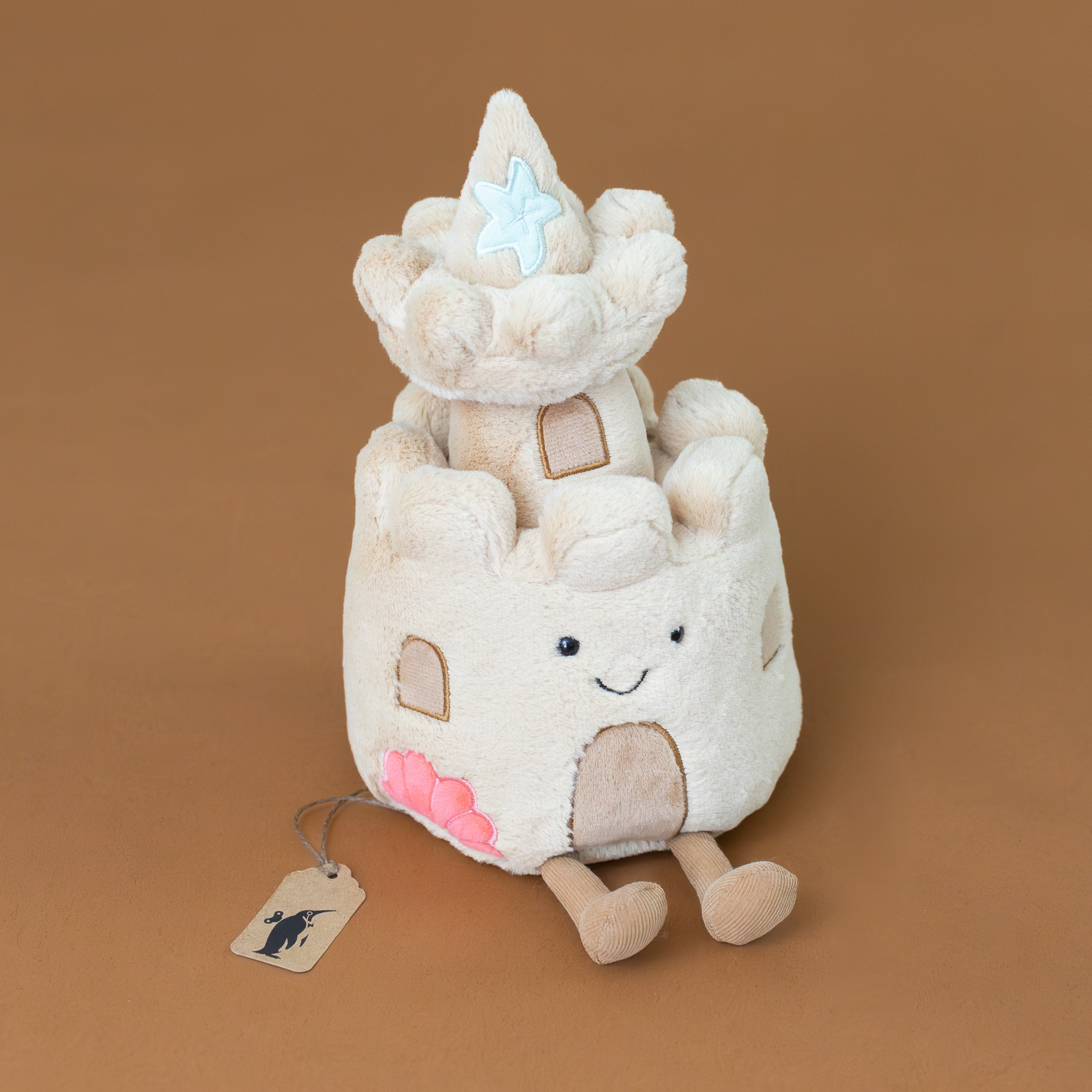 beige-amuseable-sandcastle-with-doors-windows-starfish-pink-seashell-stuffed-toy