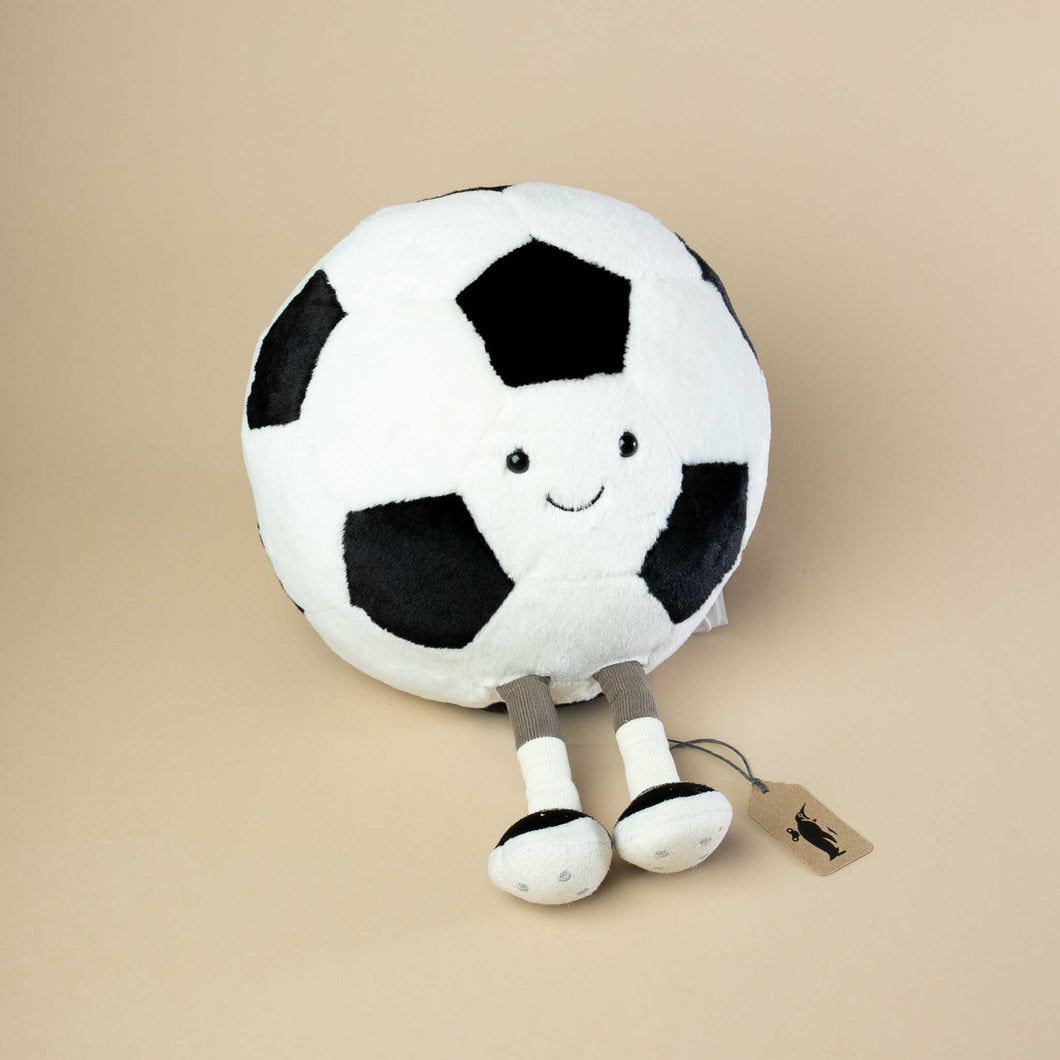 black-and-white-soccer-ball-stuffed-animal-with-sneakers-and-smiley-face