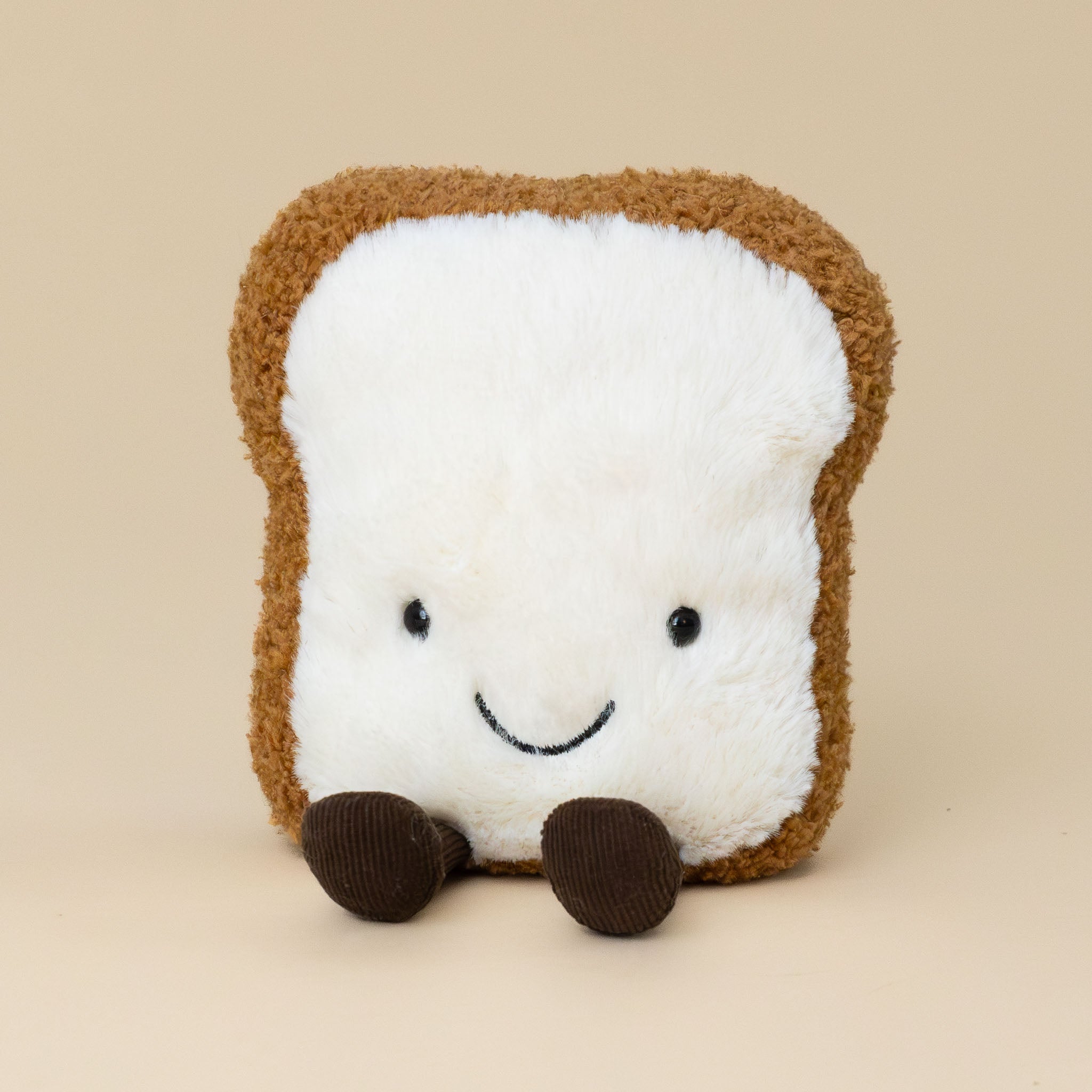 amuseable-toast--medium-white-center-with-brown-crust-and-black-boot-stuffed-toy