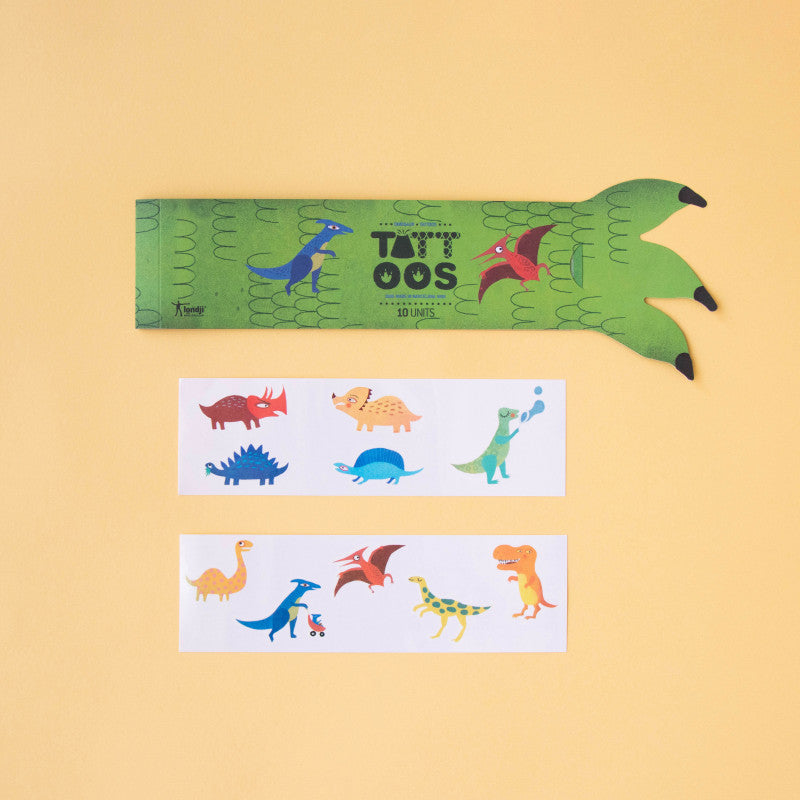 armful-of-tattoos-dinosaurs