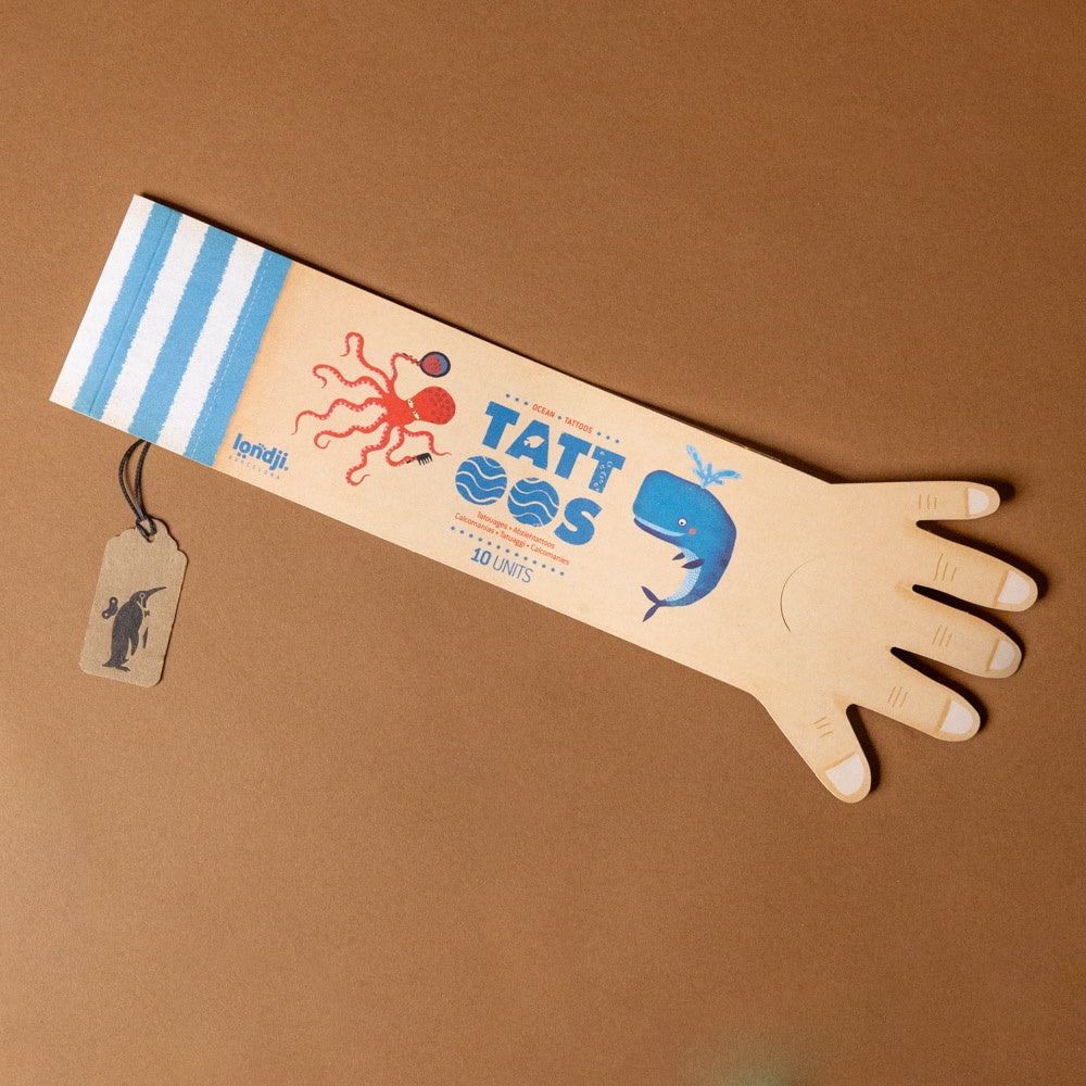 armful-of-tattoos-under-the-sea hand colorful designs 