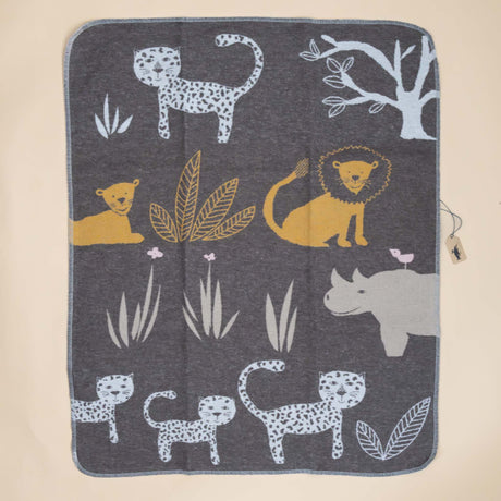 baby-blanket-jungle-with-soft-blue-yellow-beige-pink-animals-and-plants-on-charcoal-background