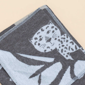 soft-blue-cheetah-with-charcoal-background-with-blanket-stitch-finish-detail