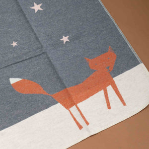 baby-blanket-starry-orange-fox-on-snowy-white-ground-showing-blanket-stitch-detail