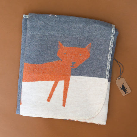 baby-blanket-starry-orange-fox-on-snowy-white-ground-showing-blanket-stitch-detail