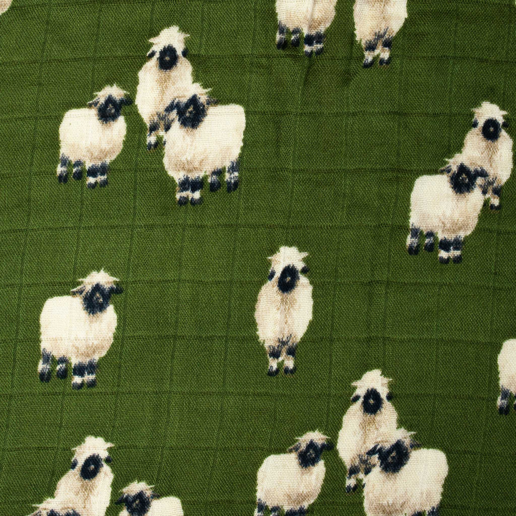 detail-showing-sheep-print-on-green-background