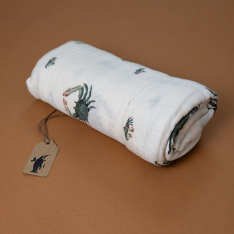 bamboo-swaddle-coastal-crab-green-and-coral-print-on-white-background