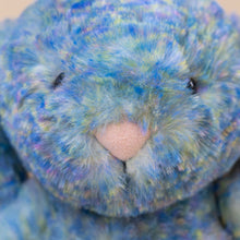 Load image into Gallery viewer, dappled-blue-green-yellow-purple-fur-with-pink-nose-of-stuffed-animal