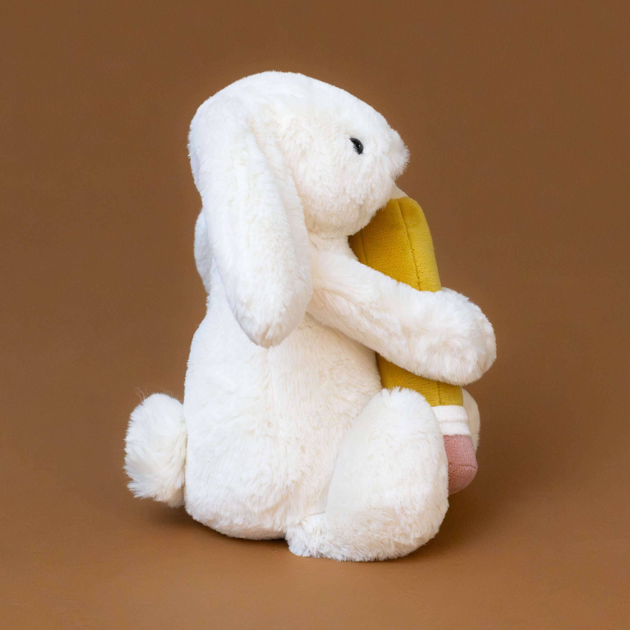 bashful-bunny-with-yellow-pencil-cream-small-stuffed-animal-side-with-white-tail