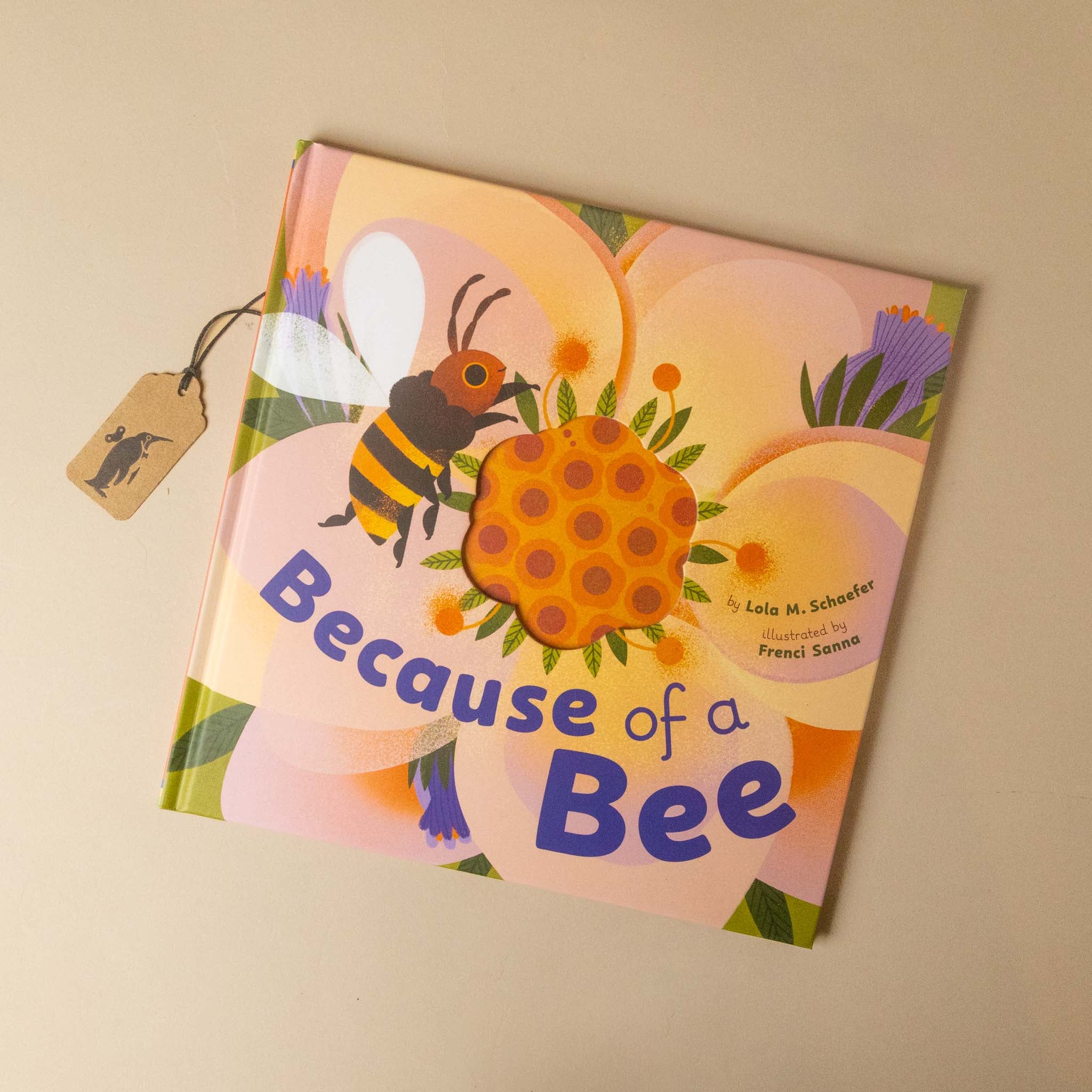 Children's book titled 'Because of a Bee' with a bee and flower illustration on the cover.