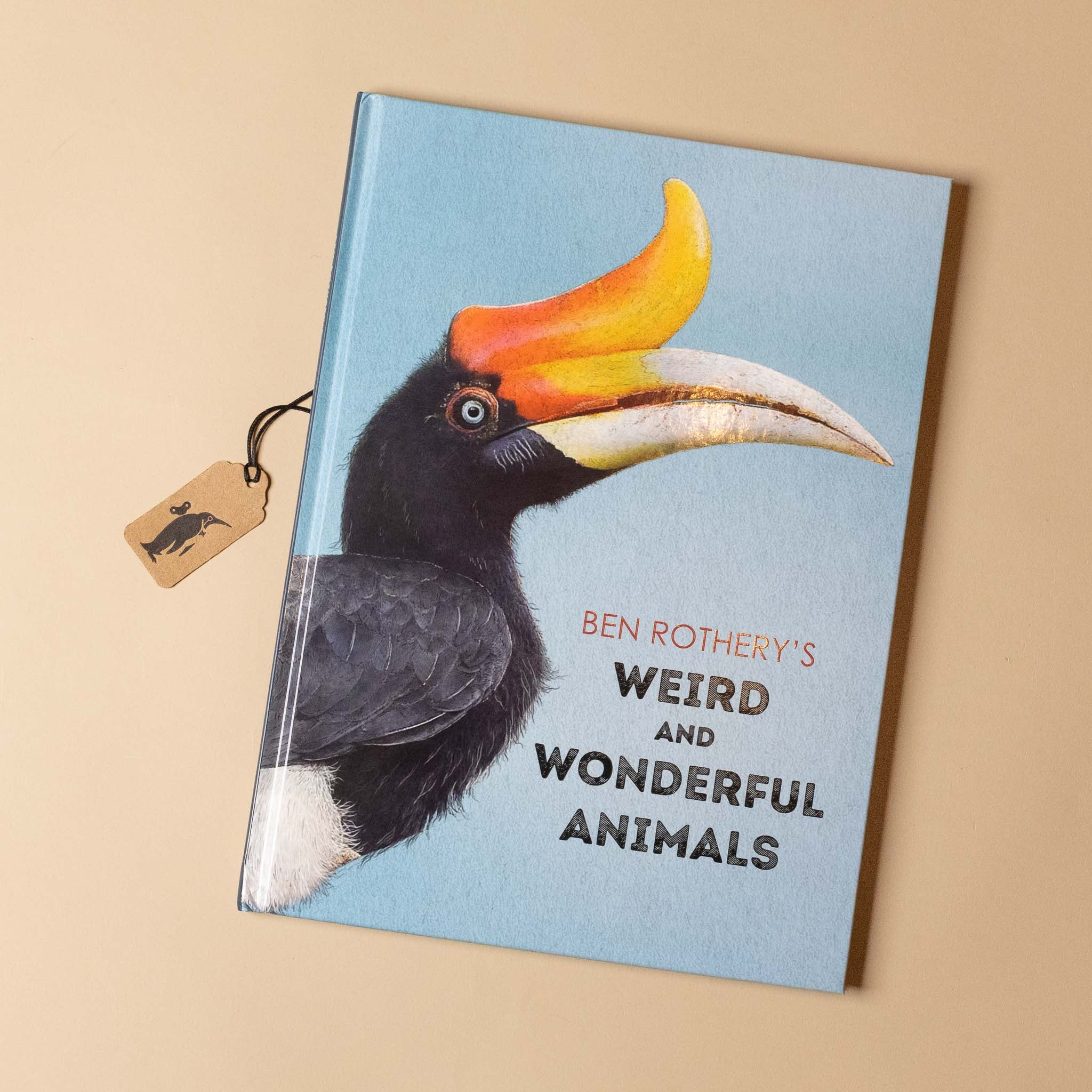 Book titled 'Weird and Wonderful Animals' by Ben Rothery with a toucan illustration on a beige background