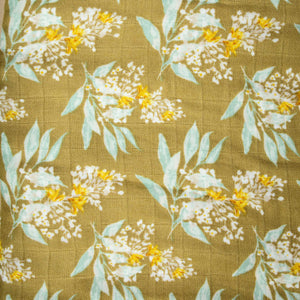 floral-print-detail-on-gold-background