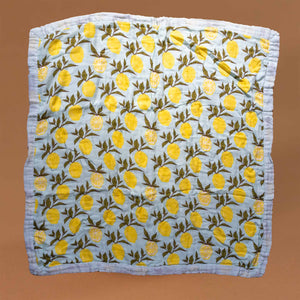 big-lovie-lemons-blanket-with-yellow-lemons-and-green-leafs-on-a-light-blue-background-square