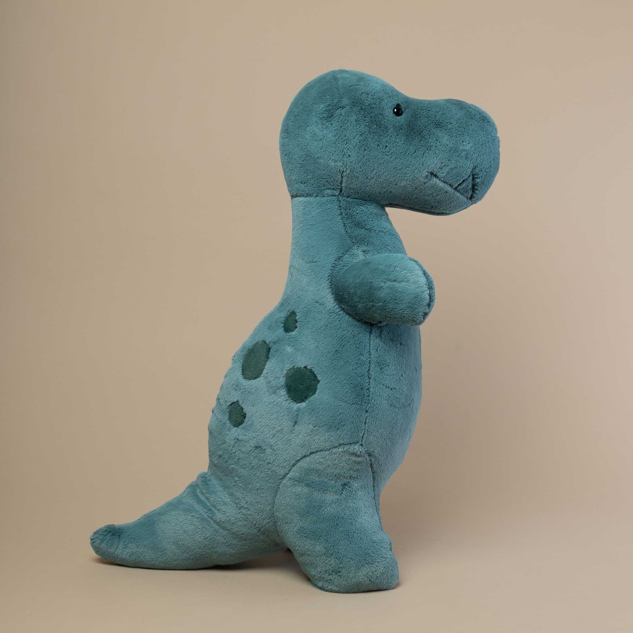 big-green-spottie-t-rex-stuffed-animal-side-showing-spots-and-tail