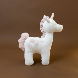 side-view-of-pink-and-soft-white-unicorn