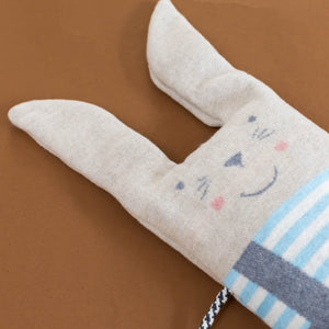 blanket-and-puppet-set-bunny-grey-overalls-with-carrot-detail-blue-white-striped-shirt-with-oatmeal-fur-blue-shoes-and-black-and-white-cord-for-arms-detail-of-rosy-cheeks-nose-eyes-smile-and-whiskers
