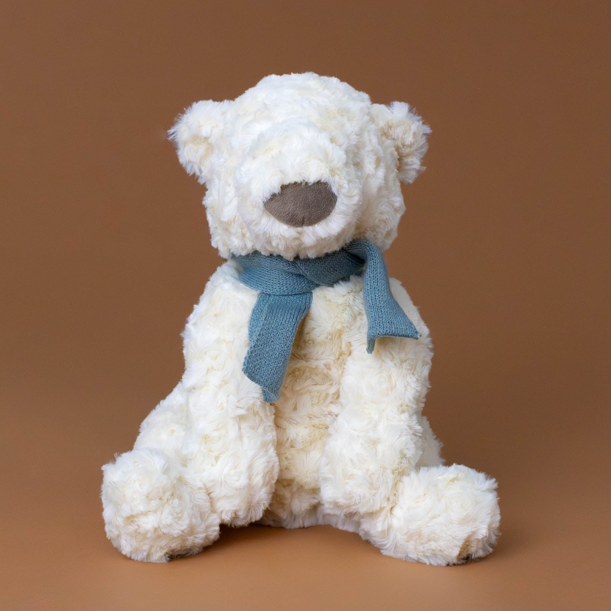 cream-fluffy-boris-bear-i-alis-polar-bear-stuffed-animal-with-blue-scarf-sitting