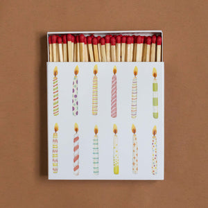 box-full-of-matches-birthday-candles-with-red-tips