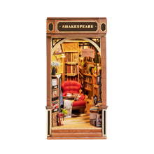 Load image into Gallery viewer, build-your-own-wooden-book-nook-petite-book-shoppe-finished-design-with-chair-surrounded-by-books-and-shakespeare-sign