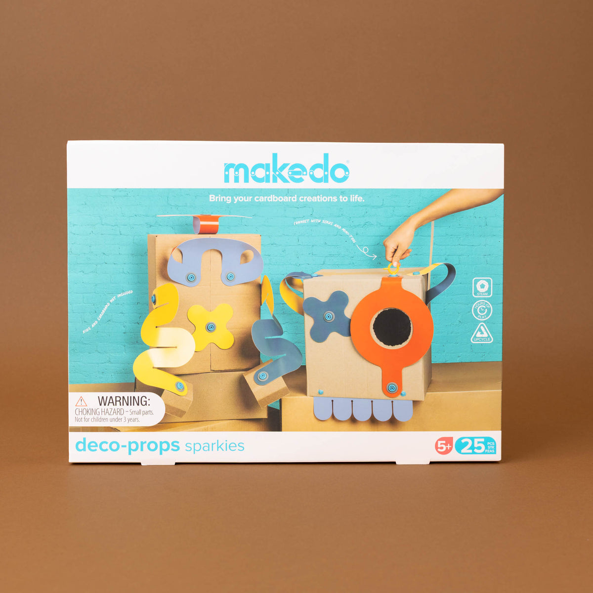  Sparkies toy set in its original retail packaging, displayed against a solid brown background.