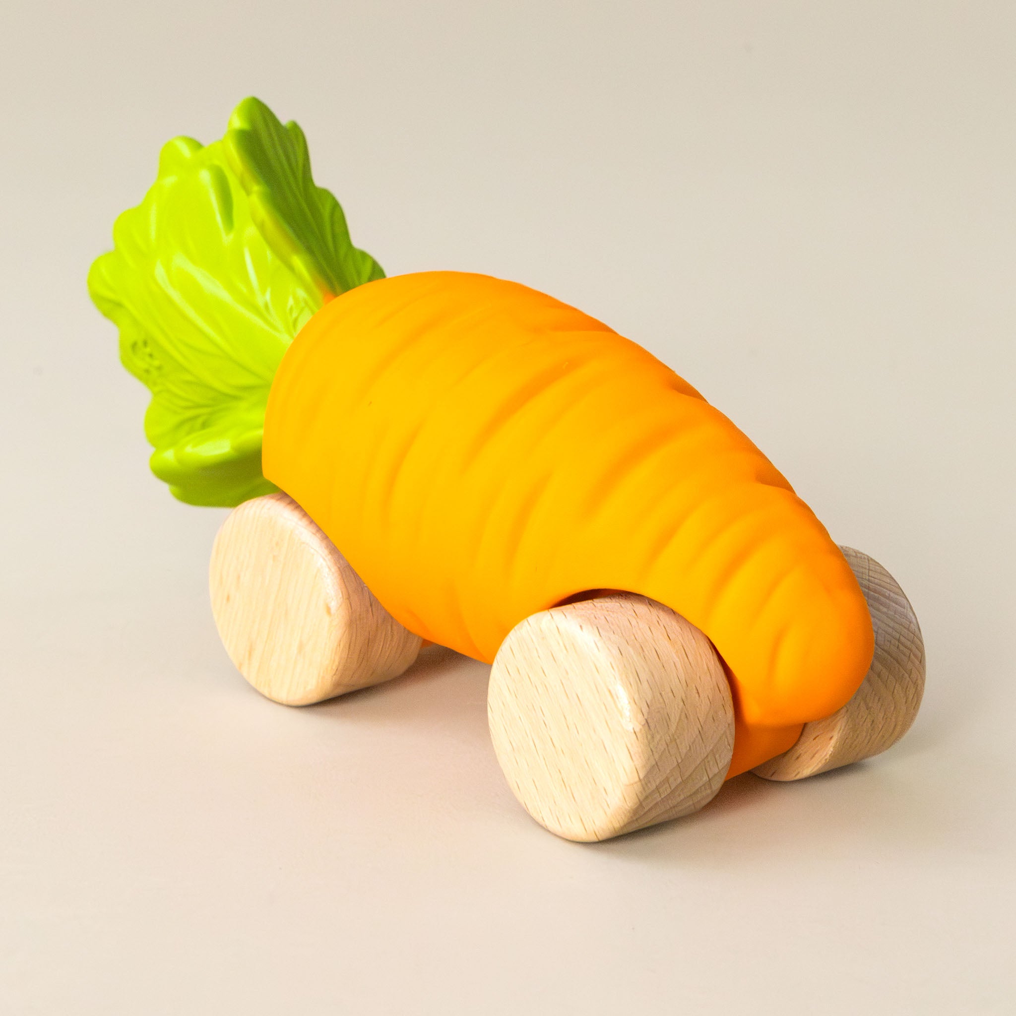 cathy-carrot-veggie-car-orange-green-stem-and-wooden-wheels