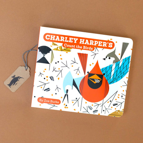 charley-harpers-count-the-birds-board-book-cover-with-cardinal-blue-jay-and-seeds-and-footprints-in-the-snow