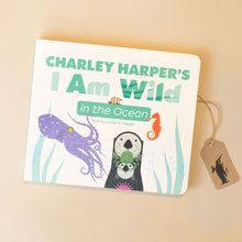 Load image into Gallery viewer, charley-harpers-i-am-wild-in-the-ocean-board-book-with-squid-crab-seahorse-and-otters-on-the-cover