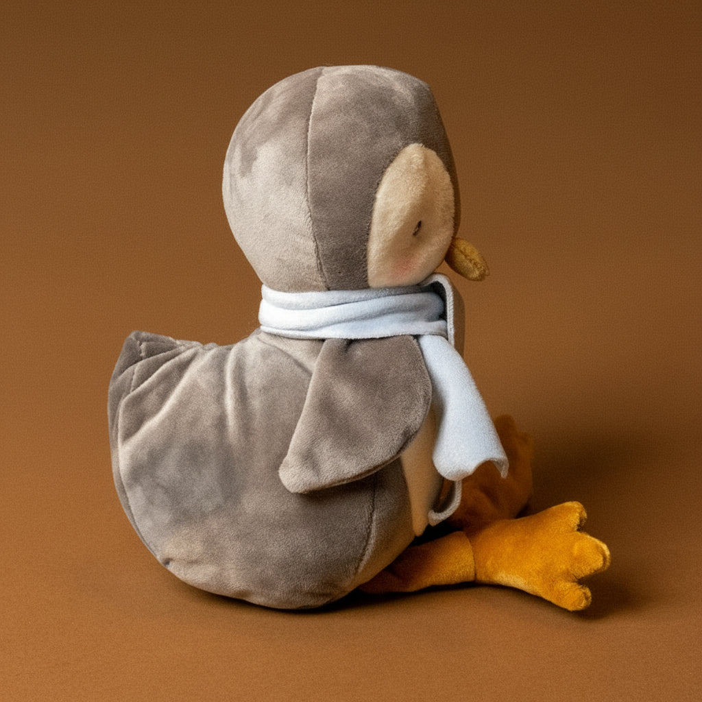 chillie-the-penguin-stuffed-animal-with-blue-scarf-side