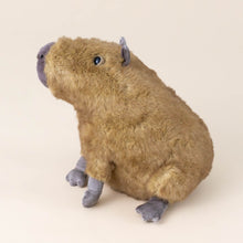 Load image into Gallery viewer, clyde-capybara-with-brown-fur-and-mocha-ears-tail-and-snout-stuffed-animal-side-view