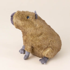 clyde-capybara-with-brown-fur-and-mocha-ears-tail-and-snout-stuffed-animal-side-view
