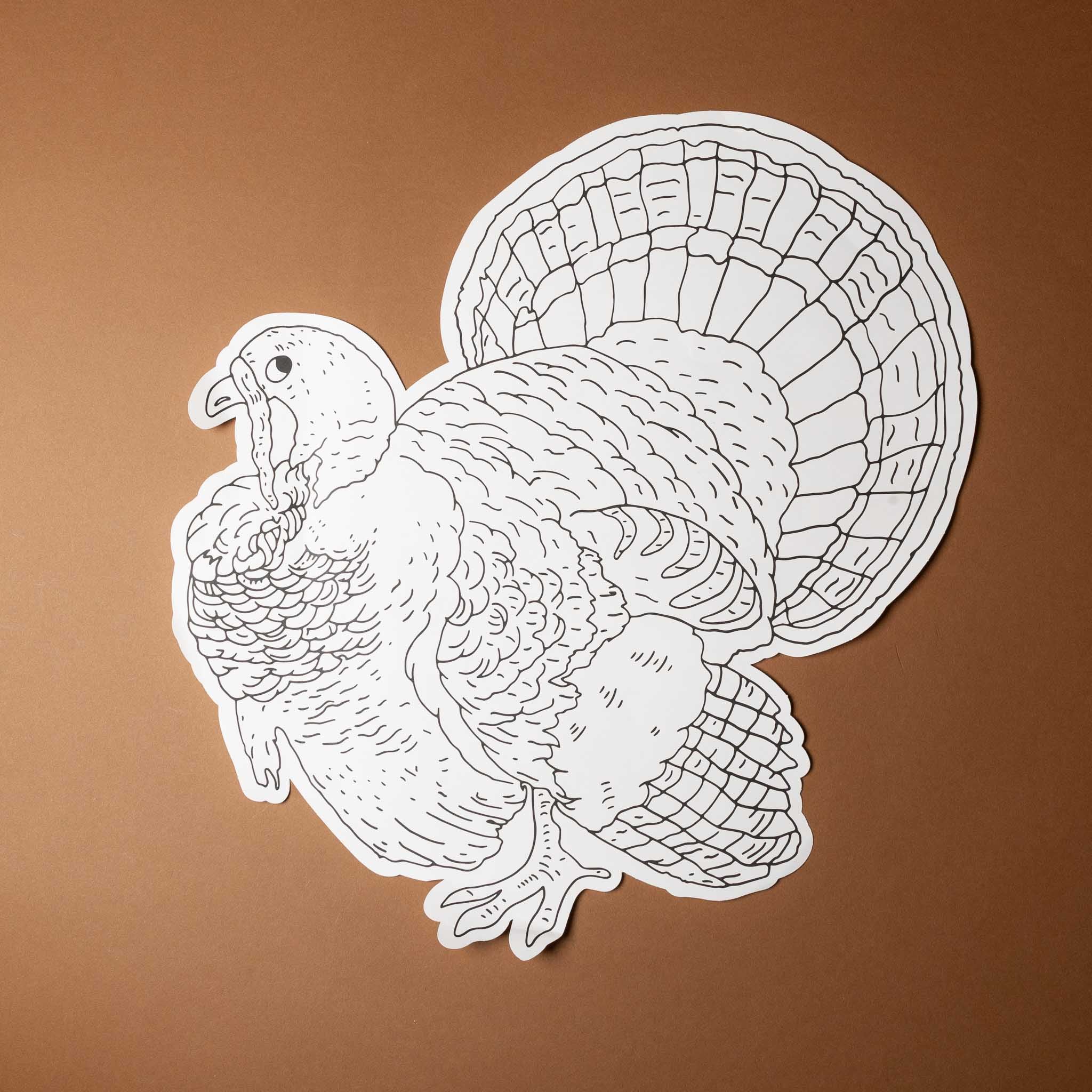 color-your-own-turkey-placemat-set White line drawing of a turkey on a brown background