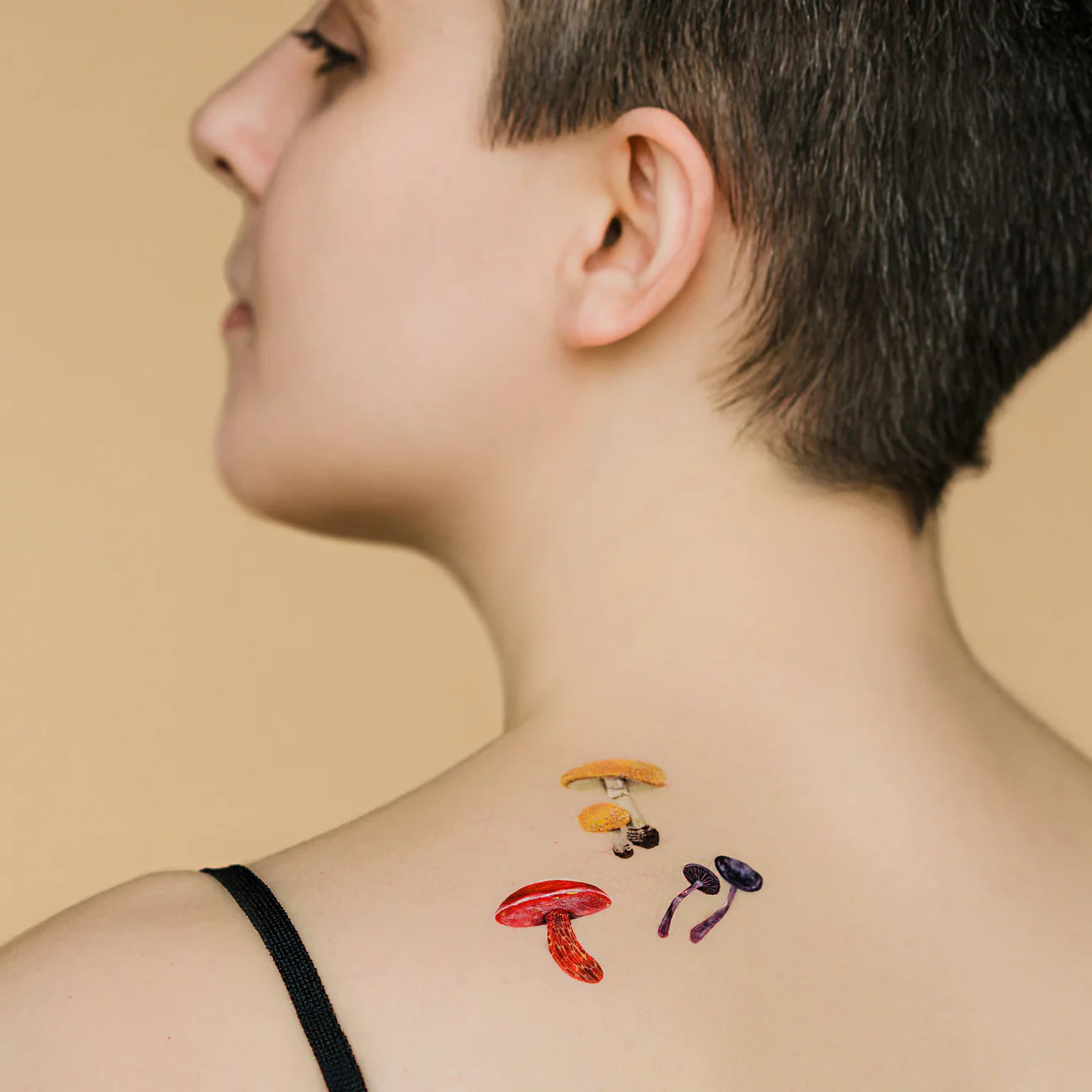 colorful-mushrooms-temporary-tattoo-sheet-applied-to-someones-back