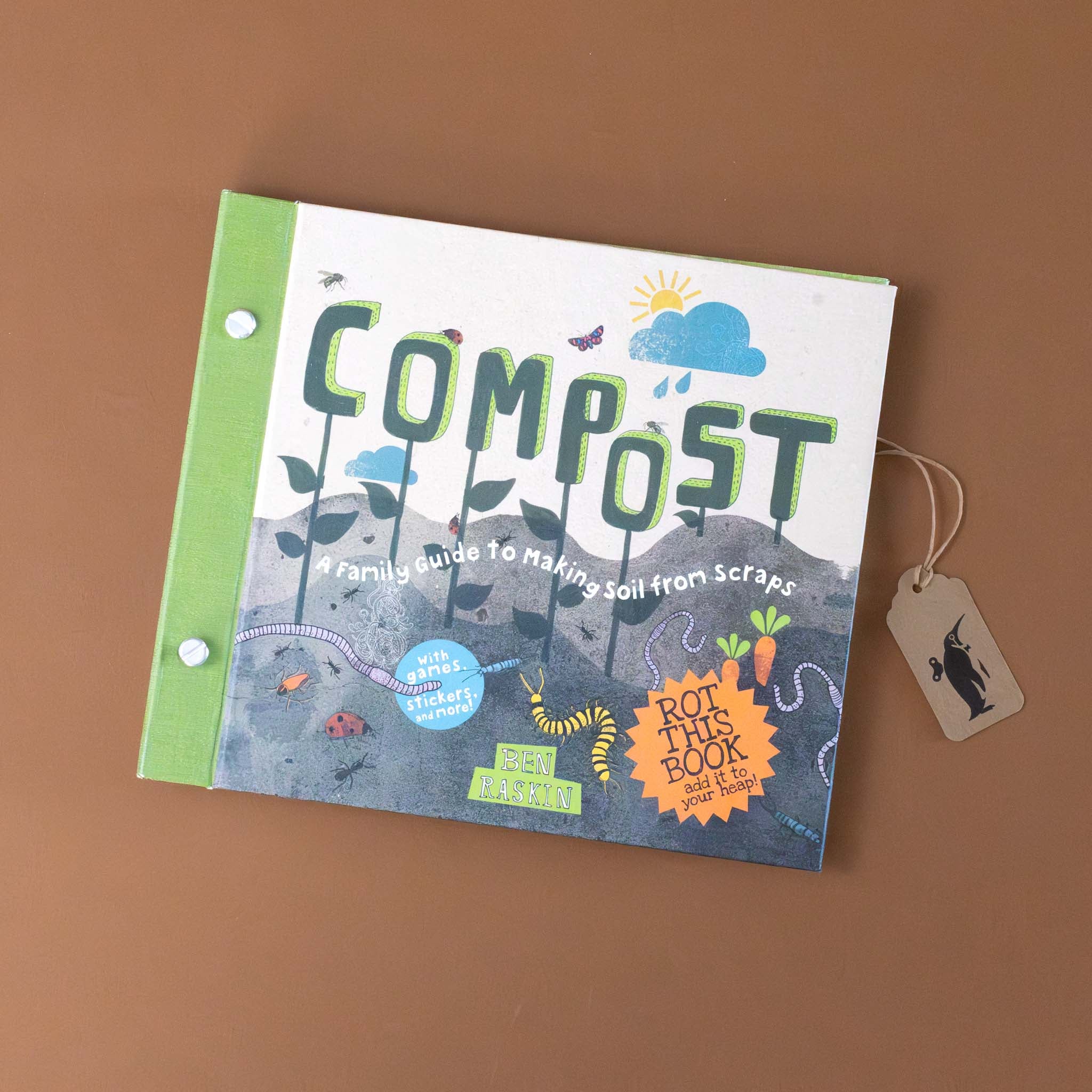 compost-a-family-guide-to-making-soil-from-scraps-book-cover-with-soil-worms-plants-and-rain-cloud